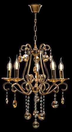 Chandelier for interior of the living room. chandelier decorated with crystals isolated on black background.の写真素材