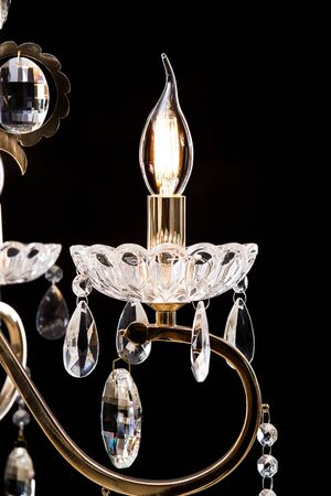 Chandelier for interior of the living room. chandelier details isolated on black background.の写真素材