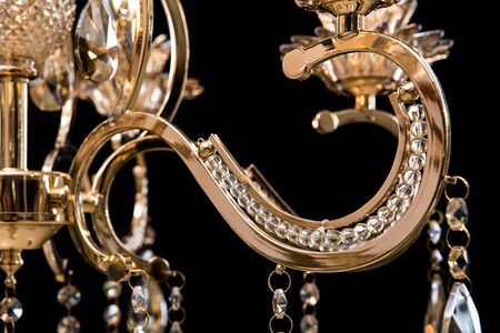 Chandelier for interior of the living room. chandelier details isolated on black background.の写真素材