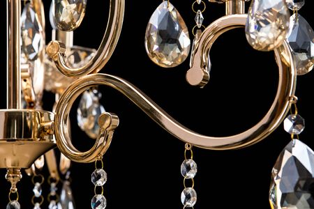 Chandelier for interior of the living room. chandelier details isolated on black background.の写真素材