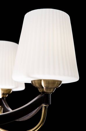Chandelier for interior of the living room. White Chandelier close-up photo isolated on black background.の写真素材