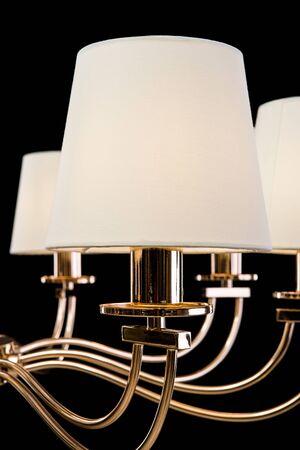 Chandelier for interior of the living room. White Chandelier close-up photo isolated on black background.の写真素材