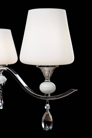 Chandelier for interior of the living room. White Chandelier close-up photo isolated on black background.の写真素材