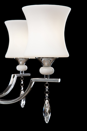 Chandelier for interior of the living room. White Chandelier close-up photo isolated on black background.の写真素材