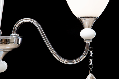Chandelier for interior of the living room. White Chandelier close-up photo isolated on black background.の写真素材