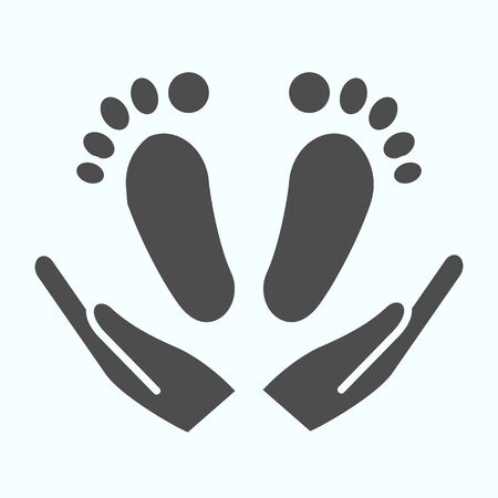 Babys feet in hands solid icon. Mom holds kids feet vector illustration isolated on white. Baby care glyph style design, designed for web and app.のイラスト素材