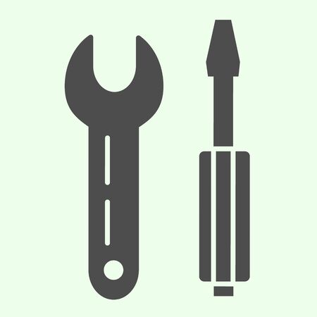 Wrench and screwdriver solid icon. Spanner and cross-shaped screwdriver glyph style pictogram on white background. Construction signs for mobile concept and web design. Vector graphics.の写真素材