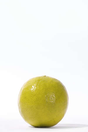 Single Grenadilla passion fruit. Yellow passion fruit on white background. Exotic fruit on white.の写真素材