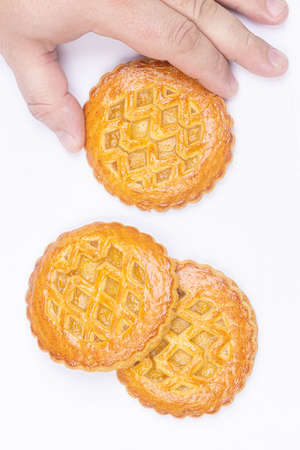 Sweet Fruit pie cookies in the handの写真素材