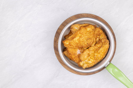 Top view of fried chicken breasts in the bowlの写真素材
