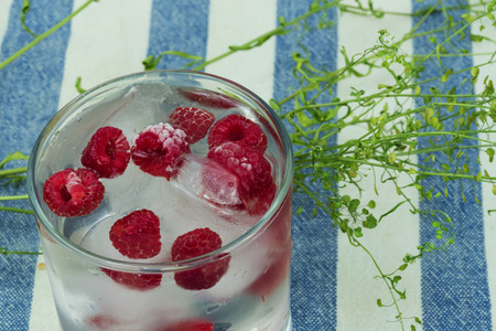 water ice frozen raspberries clean detox diet thirst summer springの写真素材