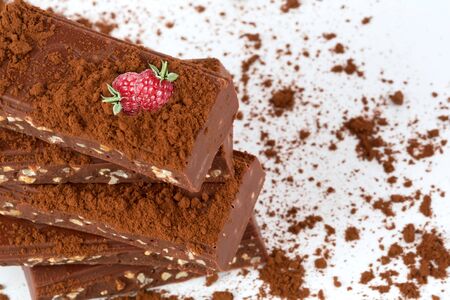 chocolate with raspberry cacao nut isolated white background is selective soft focus