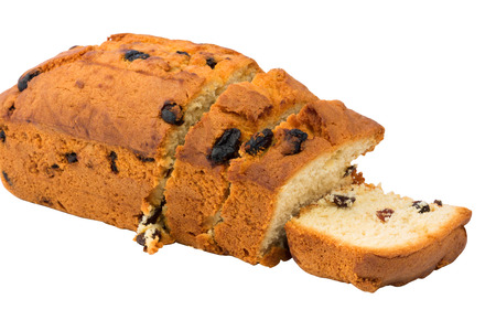 homemade raisin cake isolated on white backgroundの写真素材