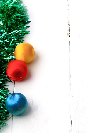 Christmas holiday decoration background rustic old tinsel fir balls winter white wooden retro vintageの写真素材
