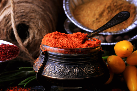 spice red ground pepper old dark wooden background rustic styleの写真素材