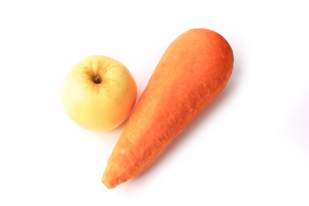 carrot and apple isolated on a white backgroundの写真素材