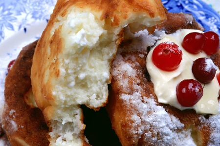 breakfast cheese pancakes with cranberries and cream a healthy diet homemade foodの写真素材