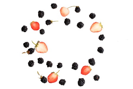 blackberry and strawberry berries on a white background top view of a flat style summer fresh berries patternの写真素材
