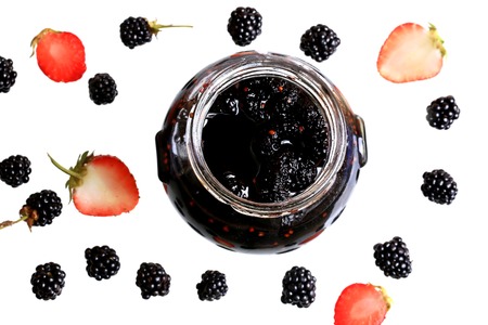 blackberry and strawberry jam on white background berry style flat top view of summer fresh berries patternの写真素材
