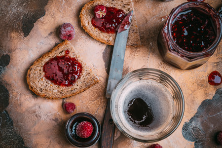coffee and toast with raspberry jam