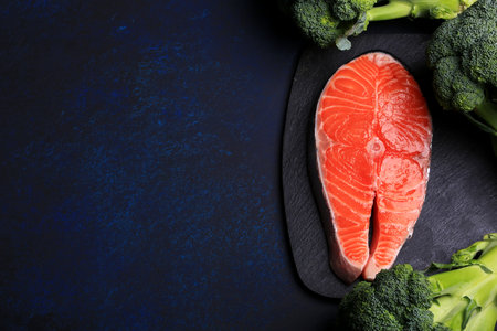 Steak of raw salmon broccoli spices flat to lieの写真素材