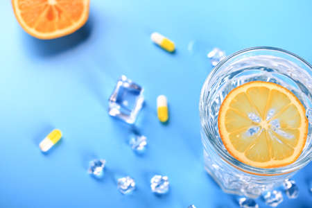 Glass with ice water and lemon. Vitamin C. Soft selective focusの写真素材
