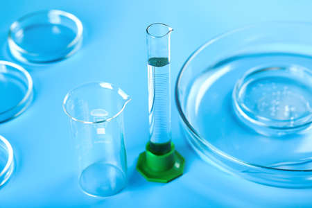 Medical abstract blue background from flasks, test tubes and petri dishesの写真素材
