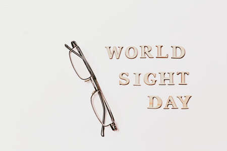 World Sight Day on 10th October. Copy Space. Glasses for improving vision. Flat lay. Top view.の写真素材