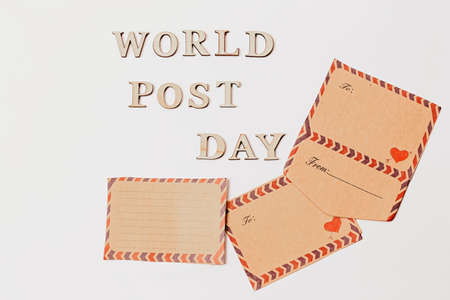 World Post Day. Mail envelopes with letters on a white background. Day of the post office and postal workerの写真素材
