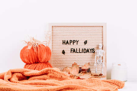Autumn inscription on letterboard. Yfppy fallidays. Hygge, autumn cozy mood, comfort concept.の写真素材