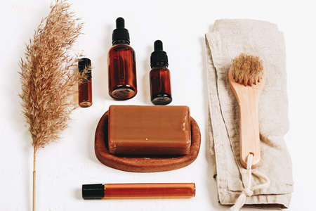 Spa Kit. Cosmetic lotions, handmade soap, cotton towel and eco wash brush. Top Viewの写真素材