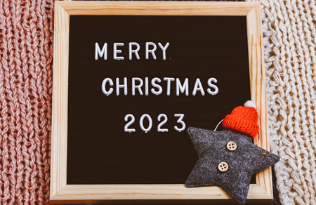 Merry Christmas lettering on letter board. . minimalistic new year background 2023