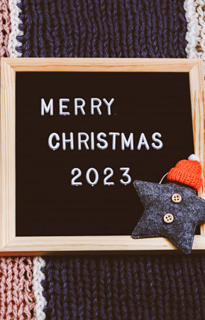 Merry Christmas lettering on letter board. . minimalistic new year background 2023