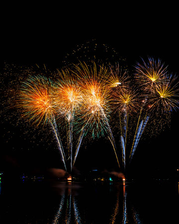 Colorful firework in a night skyの写真素材