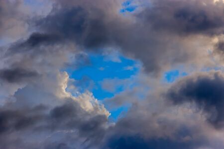 strom clouds and blue sky at back