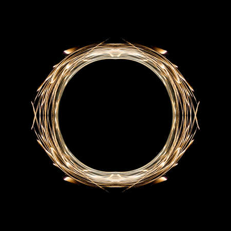Hot golden spiral. Made from firework on black sky.の写真素材