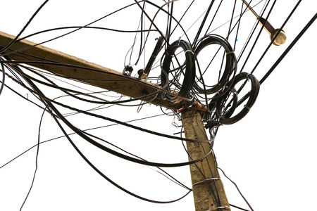 A telephone pole leans after damage from a storm.