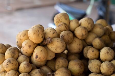 Wollongong fruit on wooden box for saleの写真素材