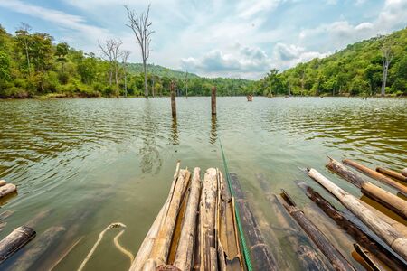 Old boat dock in lake.の写真素材