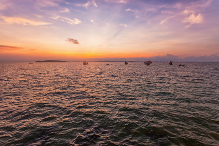 Scenic sunset over ocean beachの写真素材