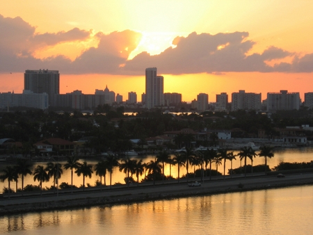 Ocean sunset Miami City and yachts in silhouetted Biscayne Bay, Florida, USAの写真素材