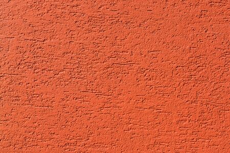 orange-red colored plaster background and texture