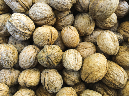 Walnuts background. Walnuts texture. Walnuts background. Organic food.の写真素材