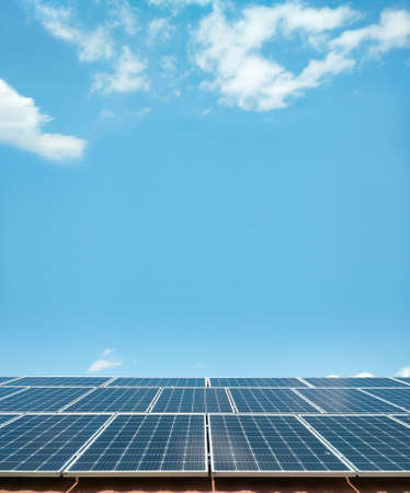 Solar panels against the blue sky. clean green energy conceptの写真素材