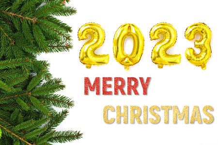 Golden foil balloons with the number 2023. Happy new year and christmas holiday concept