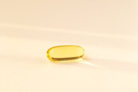 Fish oil pills. Omega 3 gel capsules on white backgroundの写真素材