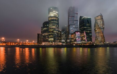 Moscow, Russia - November 6, 2015: business center Moscow City at night in the fog.のeditorial素材