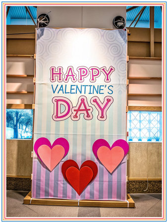 Valentine's day greeting card with hearts in a store windowの写真素材
