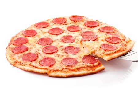Tasty Pepperoni pizza with sausage from the top on white backgroundの写真素材