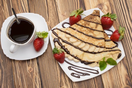 Crepes with Banana and strawberriesの写真素材